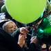 Three-year-old Rafa Balk grabs a balloon at Conor O'Neill's on Sunday, March 17. Daniel Brenner I AnnArbor.com